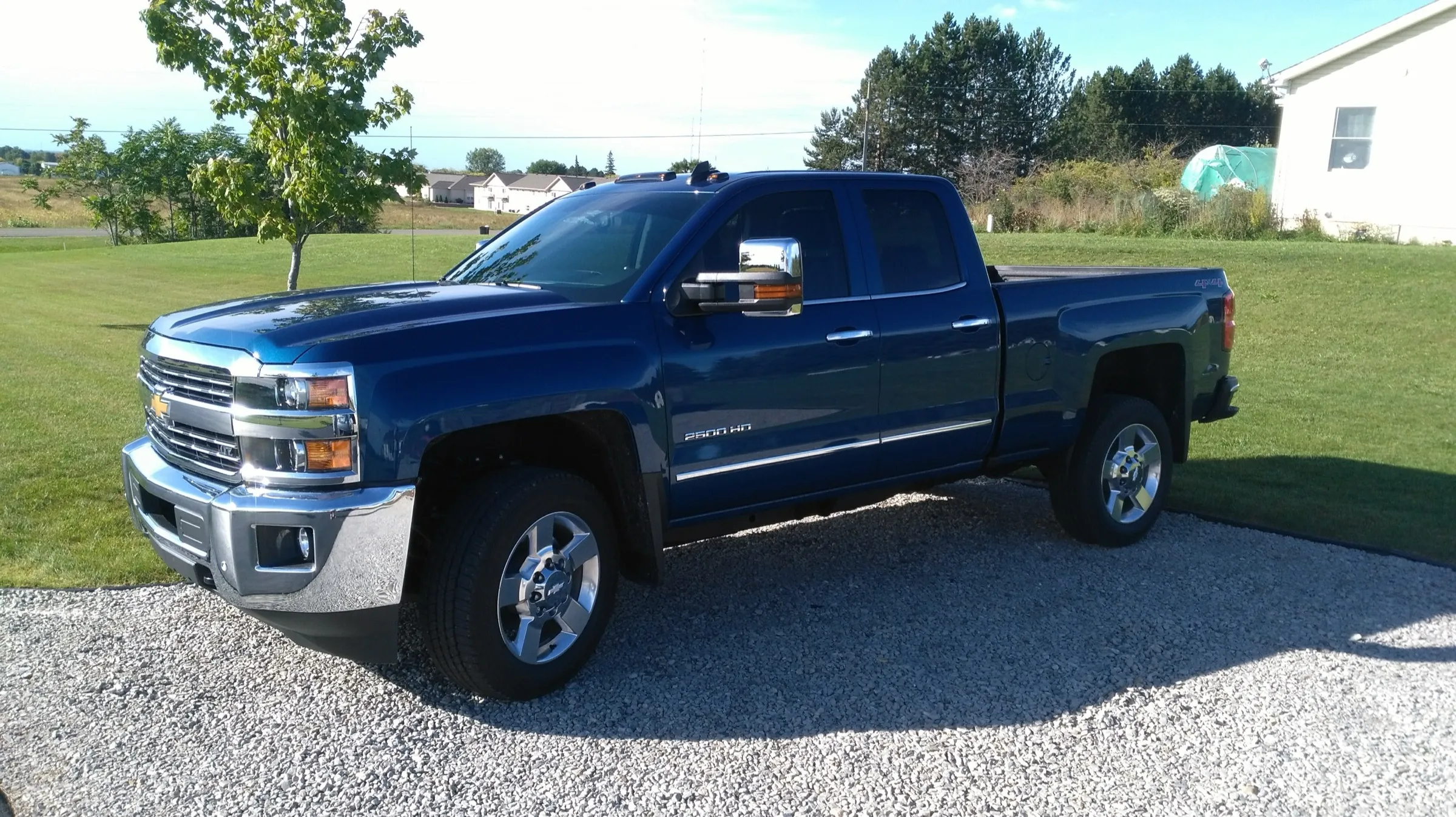 Blue Chevrolet Silverado 2500 with fresh ceramic tint